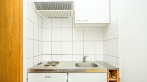 Apartamento, 1 cama doble con sofá cama | Cocina privada | Placa de cocina y utensilios de cocina