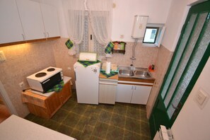 Apartamento, 1 cama de casal e sofá-cama | Cozinha privada