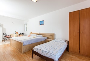 Apartamento, 2 camas de casal | Wi-Fi de cortesia, roupa de cama