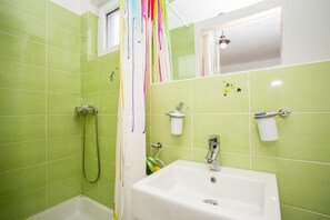 Shower, deep soaking tub