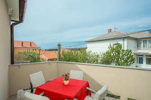 Appartement, 2 lits doubles | Balcon