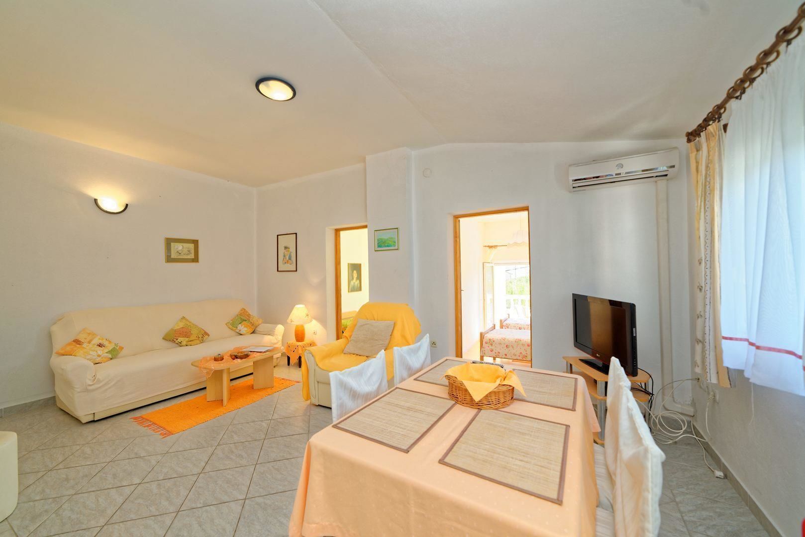 Apartment, Multiple Beds | Living room | TV