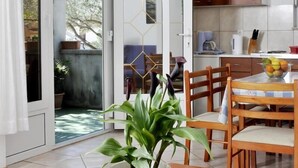 Appartement, plusieurs lits | Cuisine privée