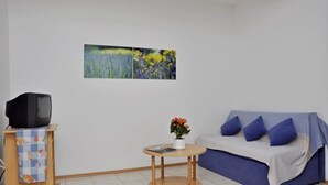 Appartement, plusieurs lits | Salle de séjour