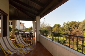 Apartamento, várias camas | Terraço/pátio