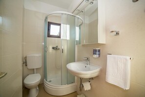 Apartment, Multiple Beds | Bathroom | Shower - Apartments Protega (Okrug)