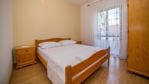Apartment, Multiple Beds | WiFi (free), bed sheets - Apartments Protega (Okrug)
