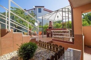 Appartamento, letti multipli | Parco della struttura