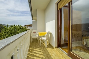 Appartement, plusieurs lits | Balcon