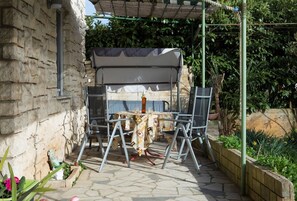 Appartement, plusieurs lits | Terrasse/Patio