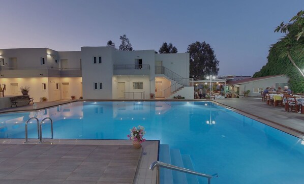 Outdoor pool, open 8:00 AM to 6:00 PM, pool umbrellas, pool loungers