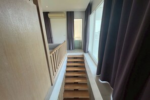  Duplex Suite | Living area | 32-inch flat-screen TV with cable channels, TV - Costa Village Jacuzzi Bangsaray (Sattahip)