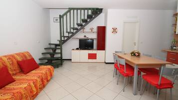 Apartment, 3 Bedrooms (70/B) | Living area | 32-inch flat-screen TV with satellite channels, TV