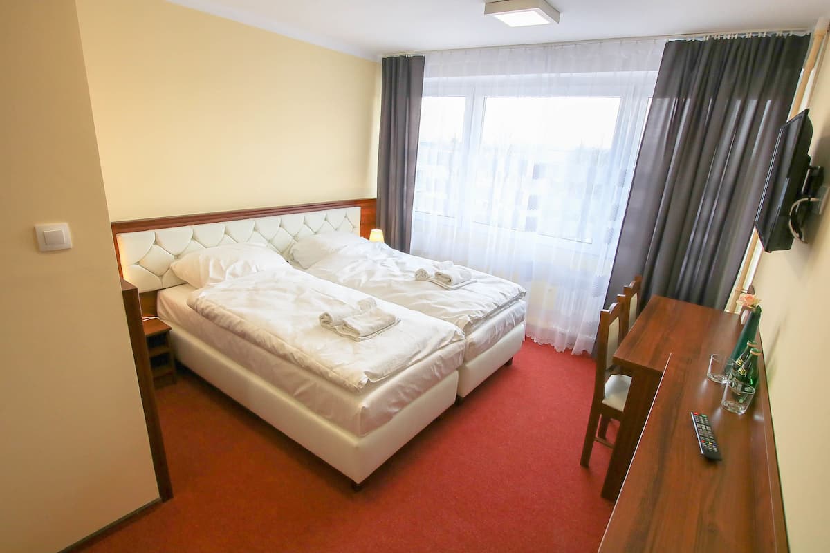 Deluxe Twin Room | Living area