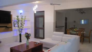 Luxury Apartment | Living room | 43-inch LED TV with satellite channels, TV