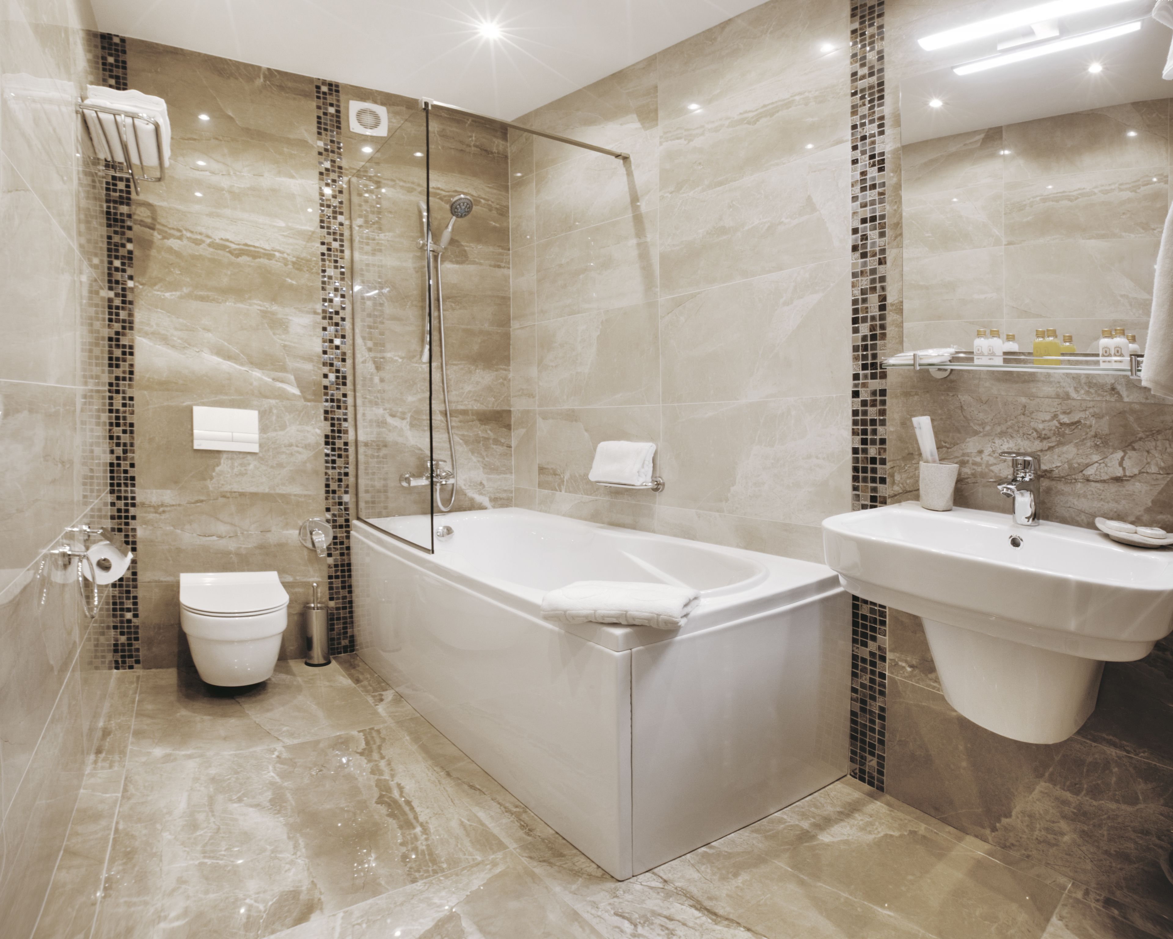 bathtub, hair dryer, slippers, towels