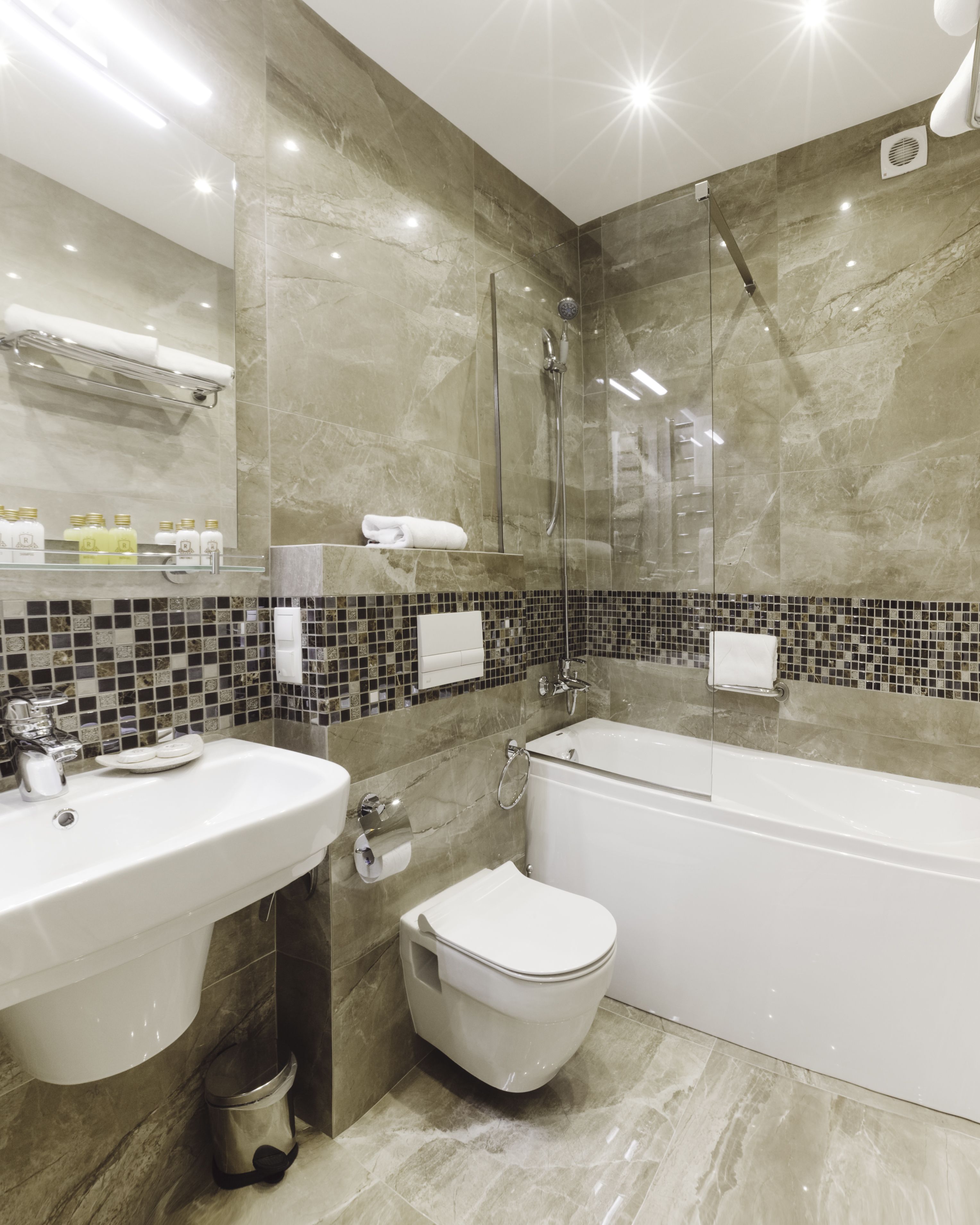 bathtub, hair dryer, slippers, towels