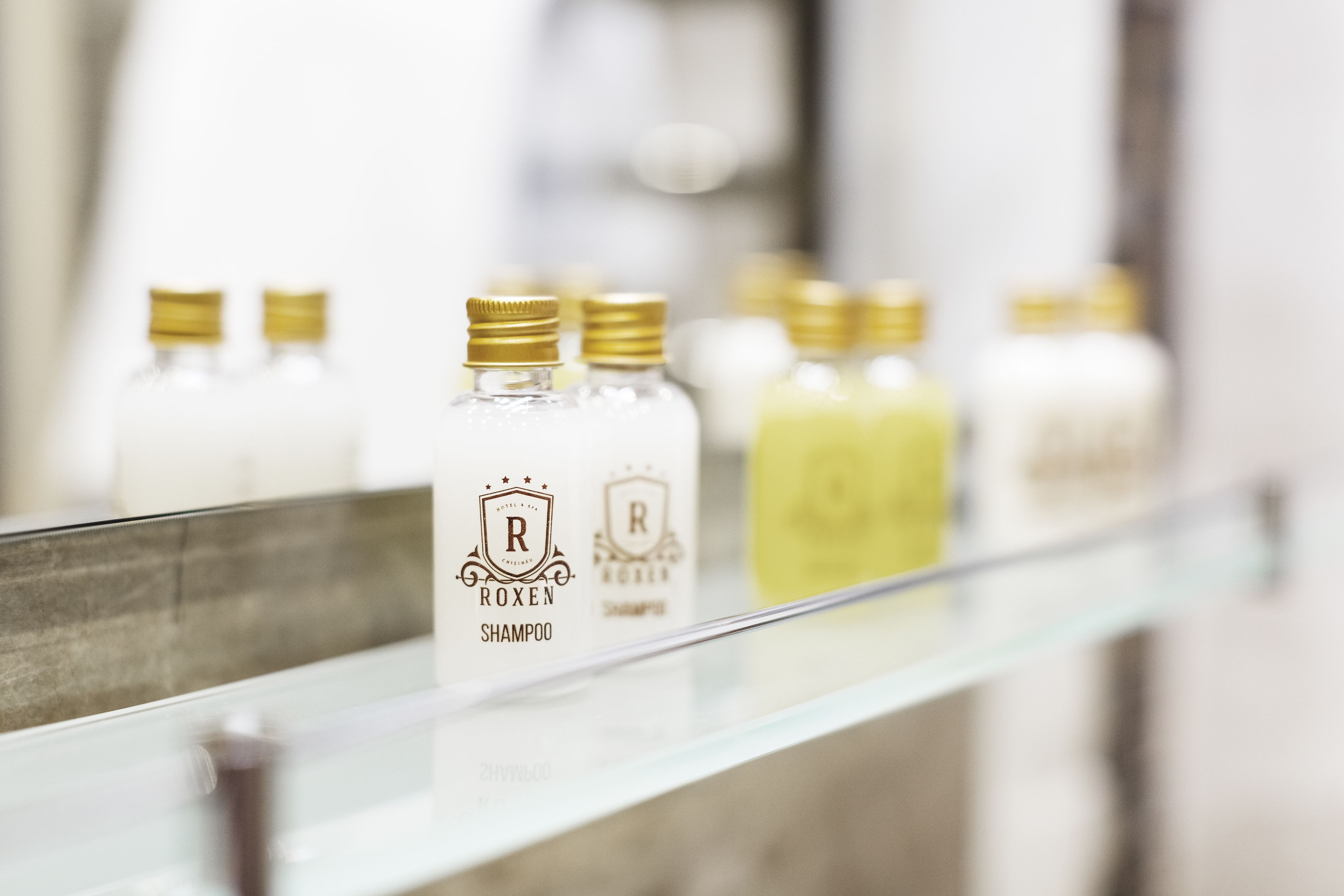 bathtub, hair dryer, slippers, towels