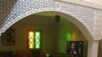 Duplex, 3 Bedrooms | Living area | Flat-screen TV