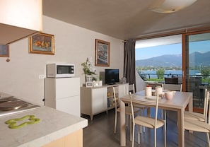 Apartment, 2 Bedrooms | Living area | Flat-screen TV