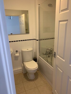 House, Multiple Beds | Bathroom | Combined shower/bathtub, deep-soaking bathtub, hair dryer, towels