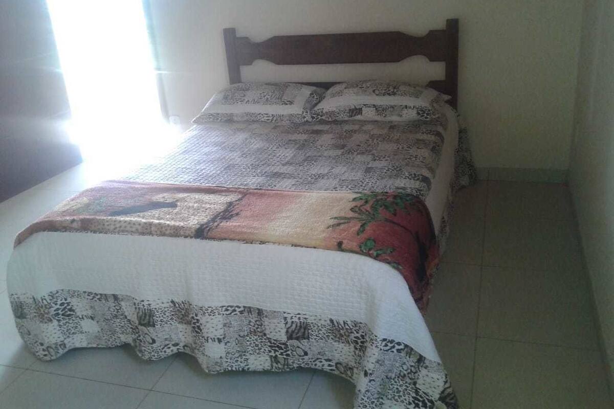 Casa básica, vista parcial para o oceano | Camas extras/dobráveis (sobretaxa), Wi-Fi de cortesia, roupa de cama