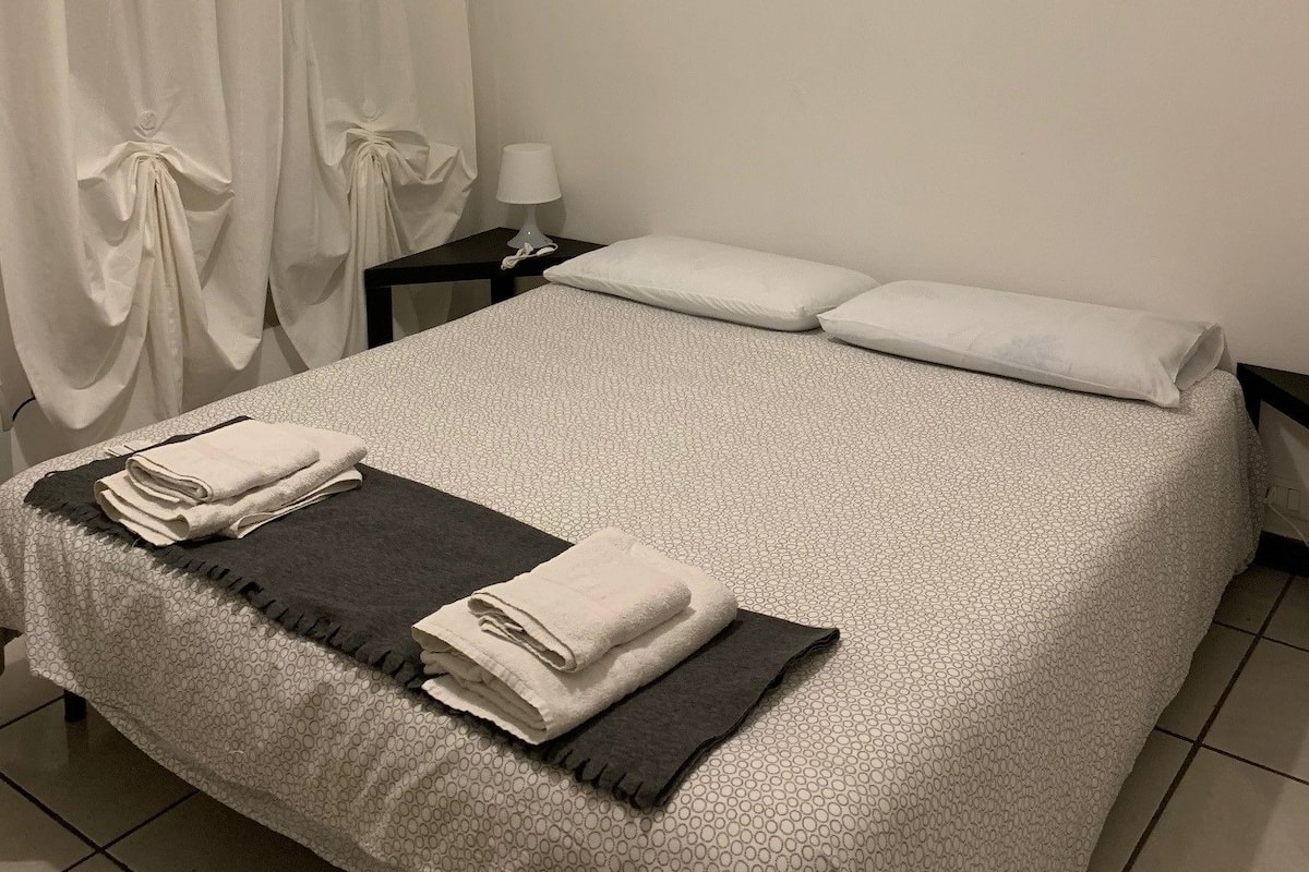 Exclusive Apartment | Down comforters, blackout drapes, free WiFi, bed sheets