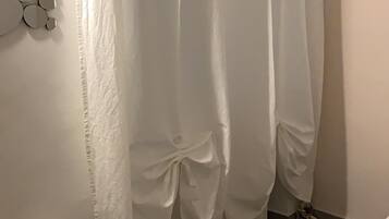 Down comforters, blackout drapes, free WiFi, bed sheets