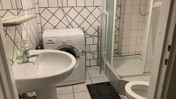 Exclusive Apartment | Bathroom | Hair dryer, towels, soap, toilet paper