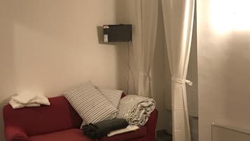 Habitación familiar, 1 cama Queen size y sofá cama | Camas extra