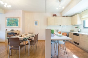 Apartment, 3 Bedrooms | Living area | Flat-screen TV, DVD player