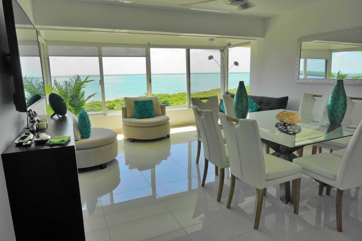 Luxury Penthouse, Ocean View | Living area | 42-inch flat-screen TV with satellite channels, plasma TV