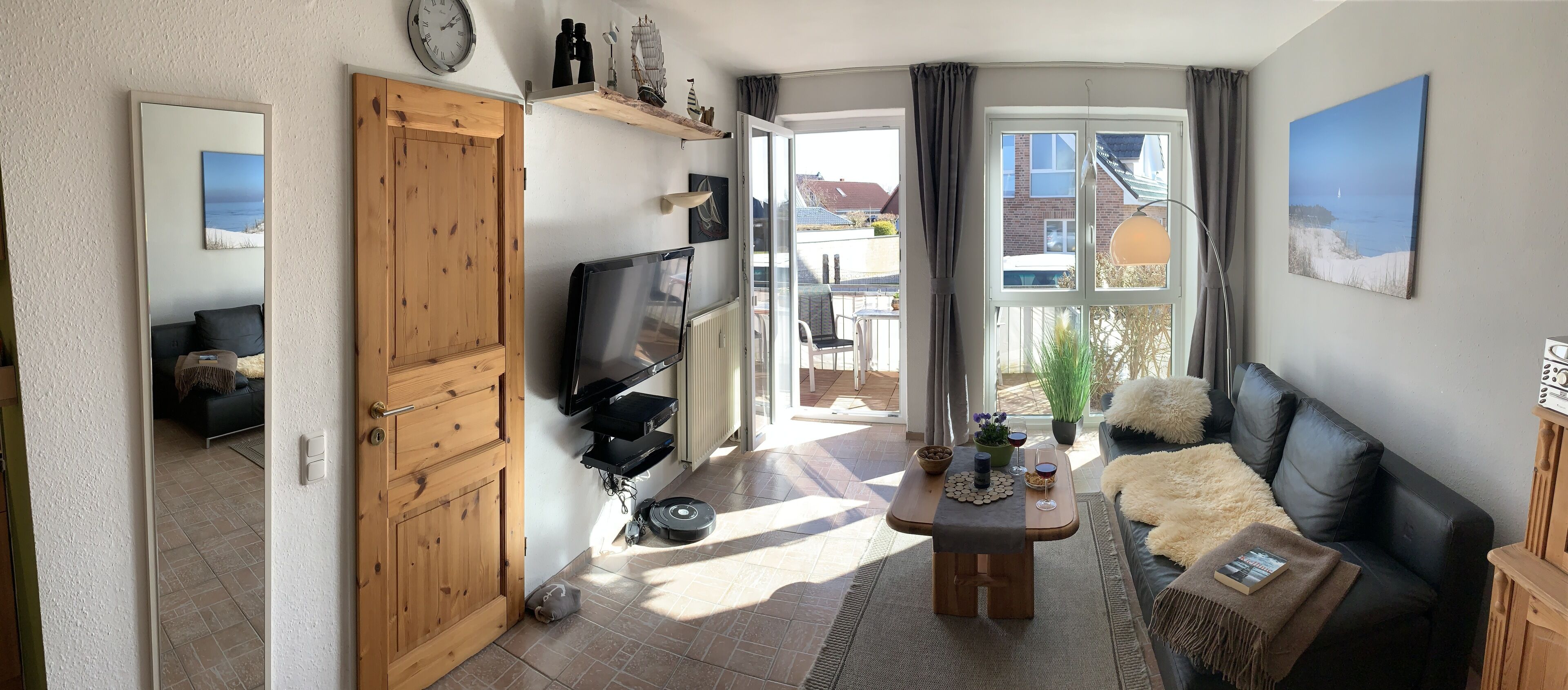 Älytelevisio, DVD-soitin, kirjoja, videokirjasto