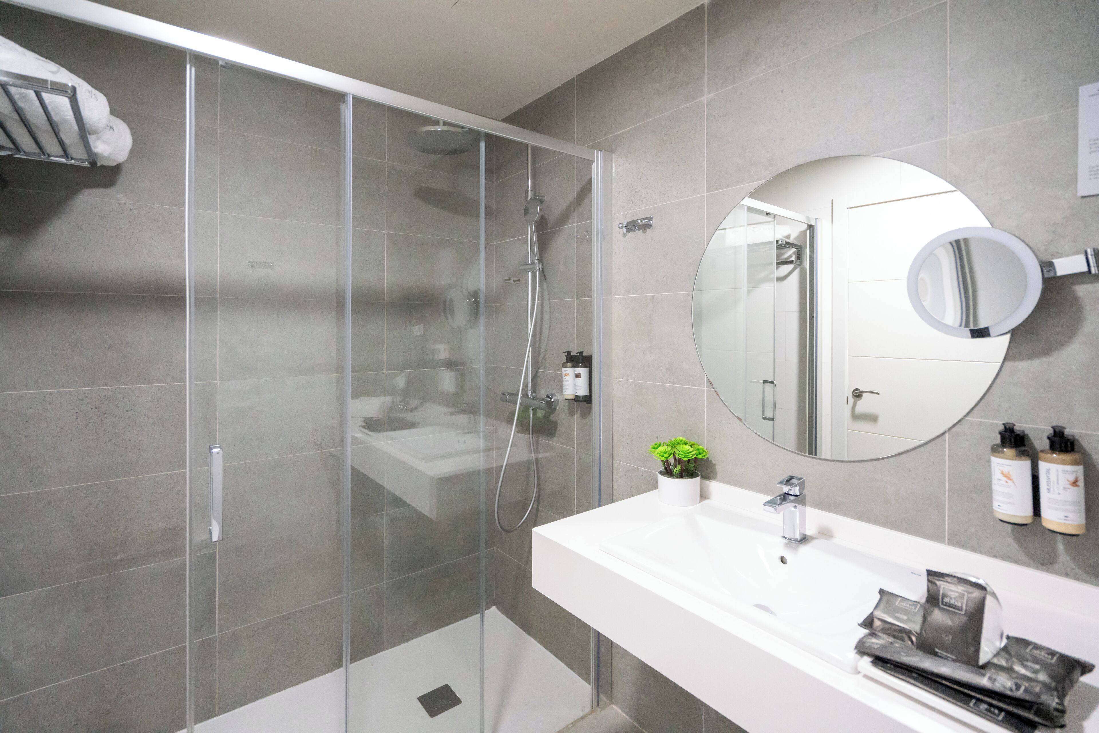 deep-soaking bathtub, rainfall showerhead, free toiletries, hair dryer