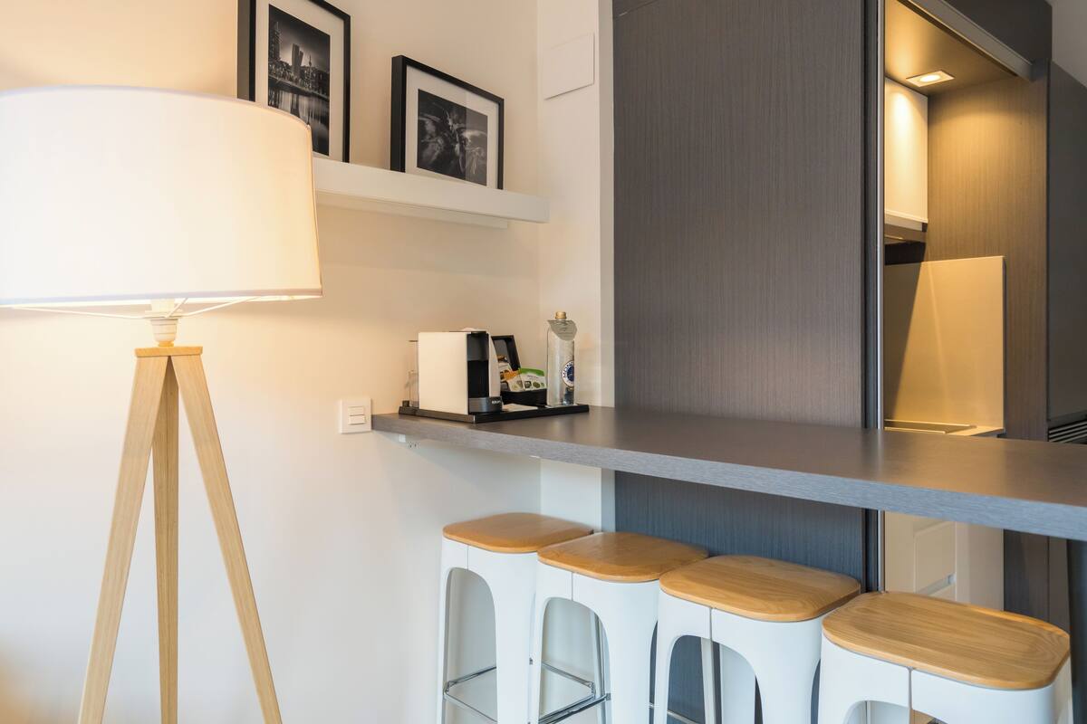 full-sized fridge, microwave, stovetop, dishwasher