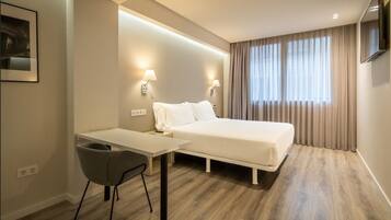 Hypo-allergenic bedding, down duvets, memory-foam beds, in-room safe