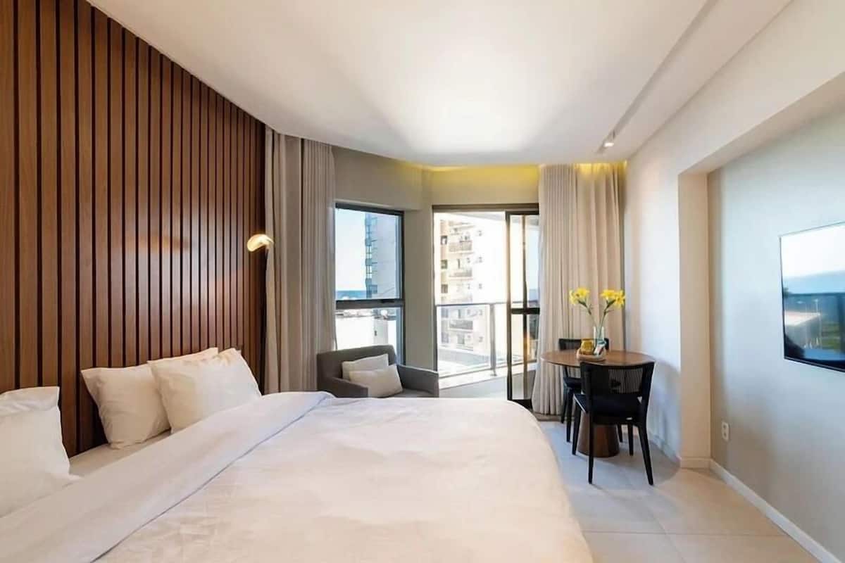 Deluxe Apartment, 1 King Bed with Sofa bed, Beach View | In-room safe, blackout drapes, soundproofing, iron/ironing board