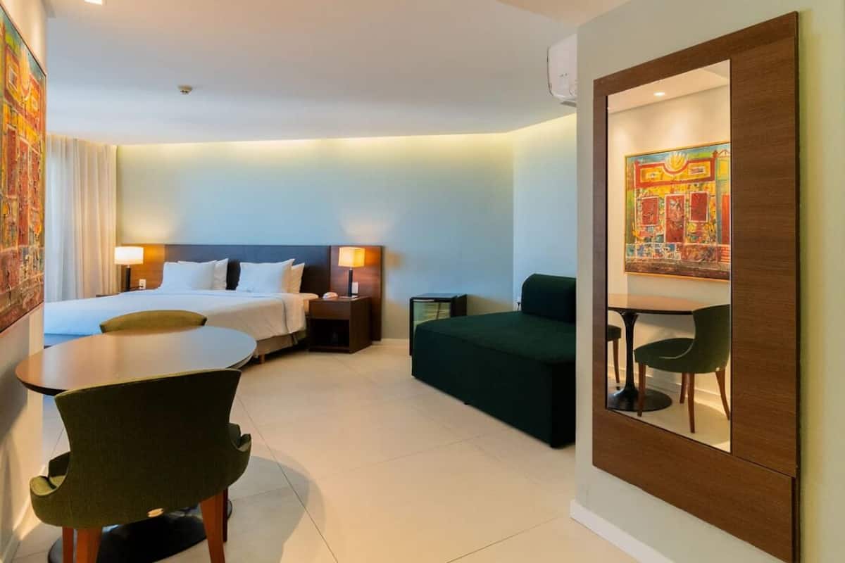 Deluxe Suite | In-room safe, blackout drapes, soundproofing, iron/ironing board