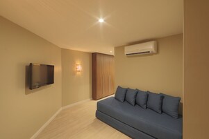 Suite Deluxe, vistas al mar | Zona de estar
