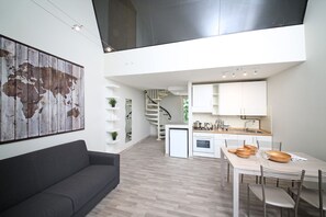 Apartment, 1 Bedroom | Living area | TV - Roccolino (San Felice del Benaco)