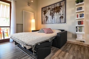 Apartment, 1 Bedroom | Living area | TV - Roccolino (San Felice del Benaco)