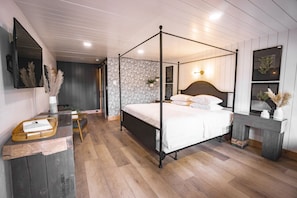 Habitación individual Deluxe, 1 cama King size | Edredón, escritorio, wifi gratis y ropa de cama