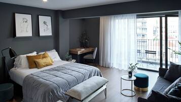 Blackout curtains, soundproofing, iron/ironing board