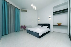 Apartamento Deluxe, 1 cama de matrimonio grande con sofá cama, vistas a la ciudad | Zona de estar