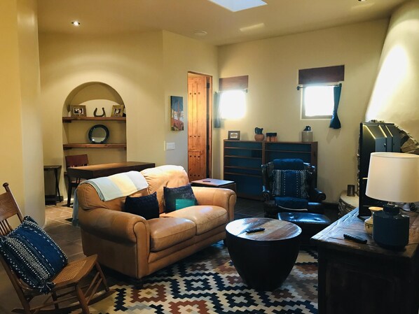 TV, fireplace, books