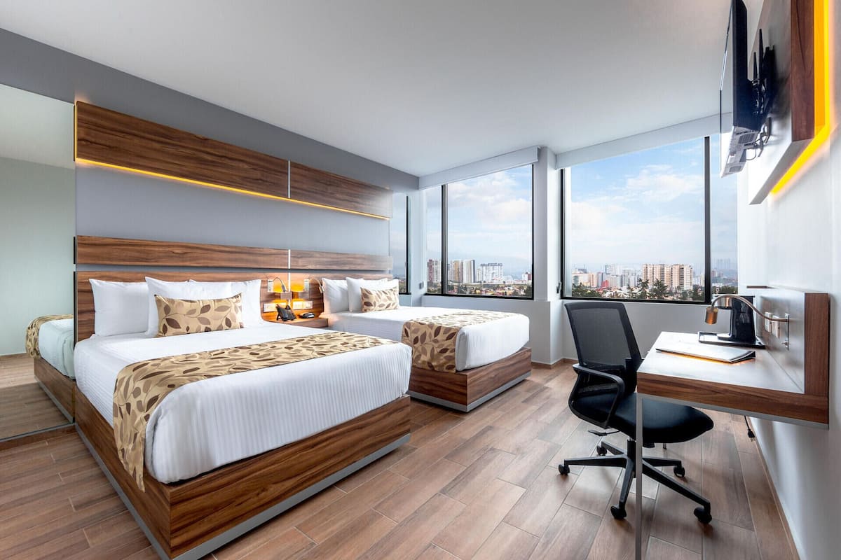 Pillowtop beds, in-room safe, desk, laptop workspace