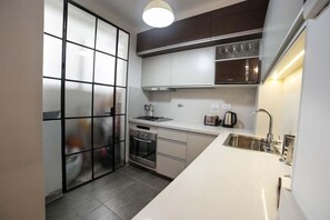 Apartment, 1 Queen Bed with Sofa bed, Private Bathroom | Shared kitchen
