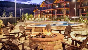 A hotel with a pool, outdoor seating, and a fire pit. - Hyatt Vacation Club at The Ranahan (Breckenridge)