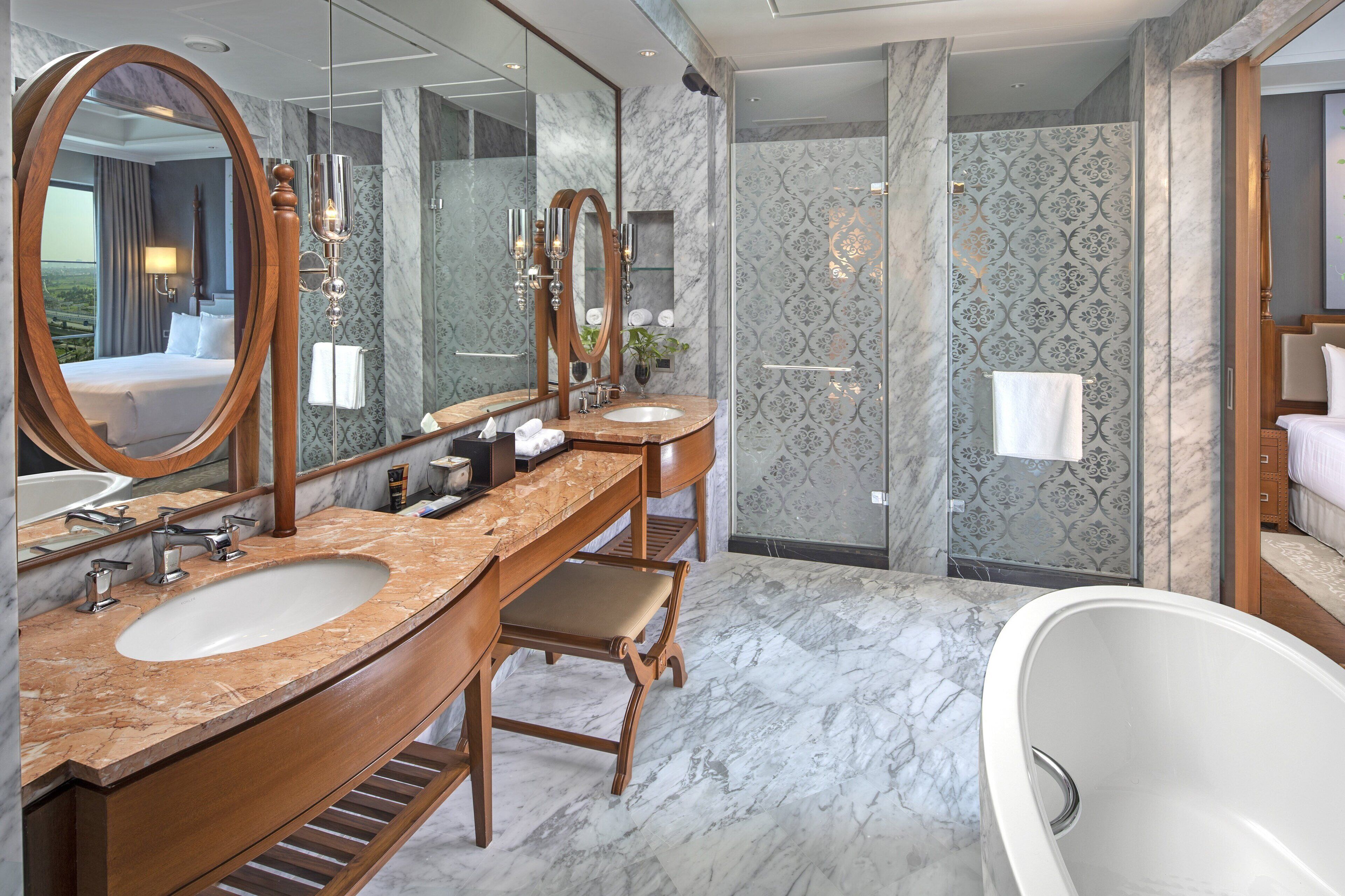 deluxe room, 1 double bed, non smoking, city view | bathroom | separate bathtub and shower, rainfall showerhead, designer toiletries