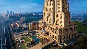 A high-rise hotel with a central courtyard and a view of the surrounding cityscape. - ITC Royal Bengal, a Luxury Collection Hotel, Kolkata (Kolkata)